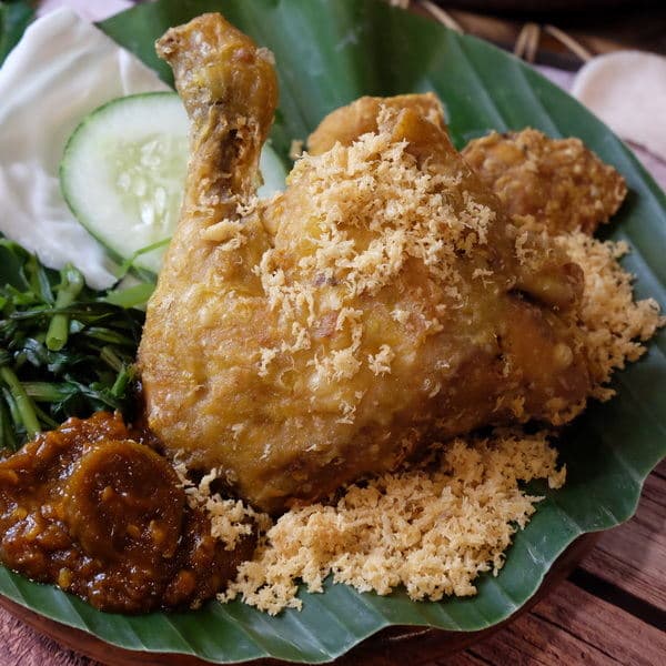 Ayam penyet with sambal and vegetables, ready for your next meal